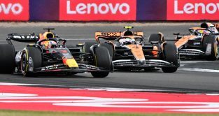 Max Verstappen leads the McLaren MCL60s at Silverstone. Britain July 2023