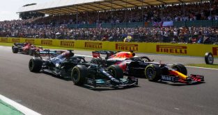 Lewis Hamilton side-by-side with Max Verstappen. Silverstone July 2021.