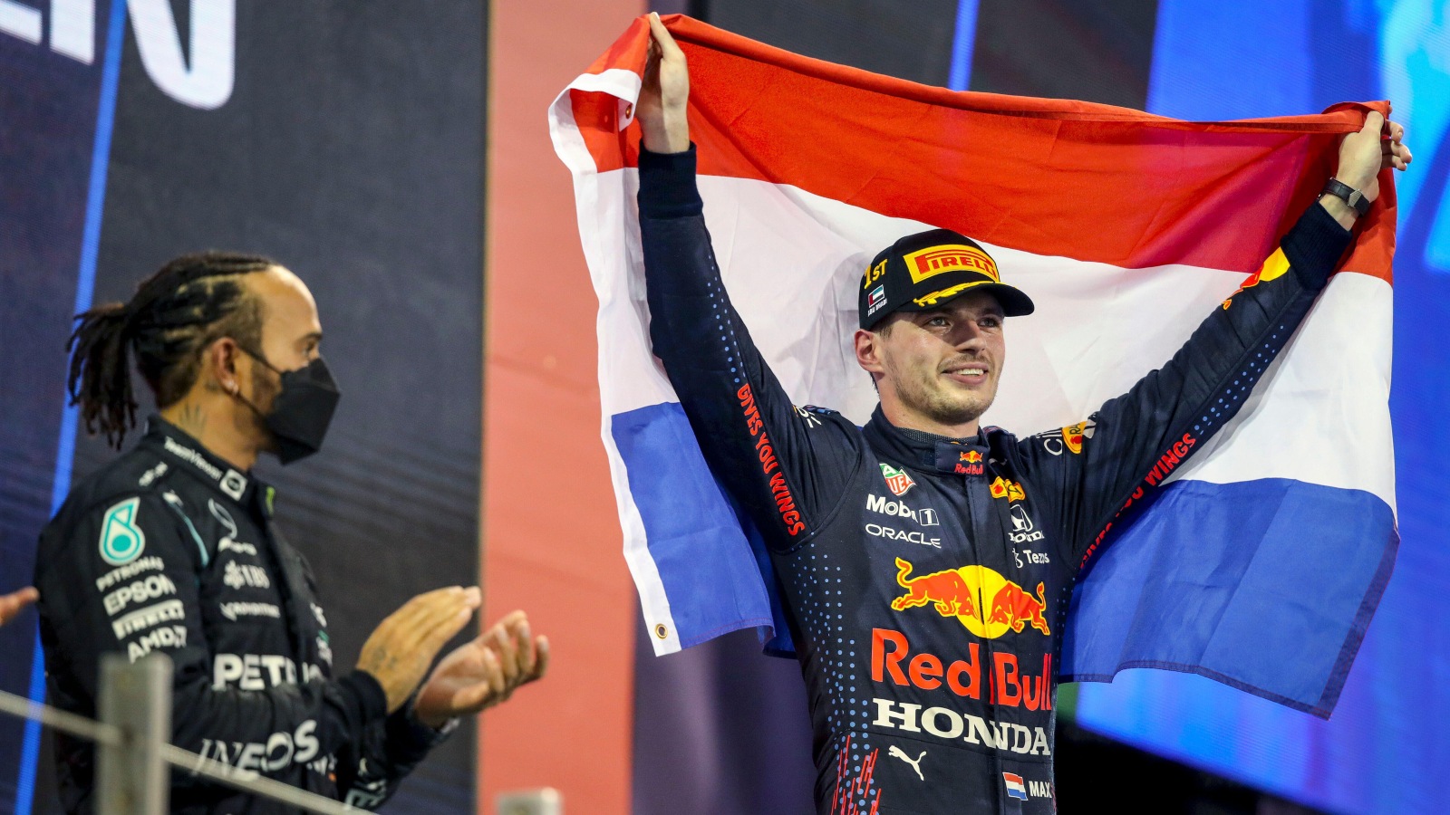 Max Verstappen celebrates in front of Lewis Hamilton. Abu Dhabi, December 2021