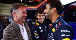 Christian Horner and Daniel Ricciardo smiling. Silverstone, July 2023.