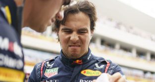 Red Bull driver Sergio Perez grimaces as he prepares for the start of the Miami Grand Prix. Miami, May 2023.