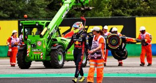 Sergio Perez walks away from his crashed RB19. Hungary July 2023