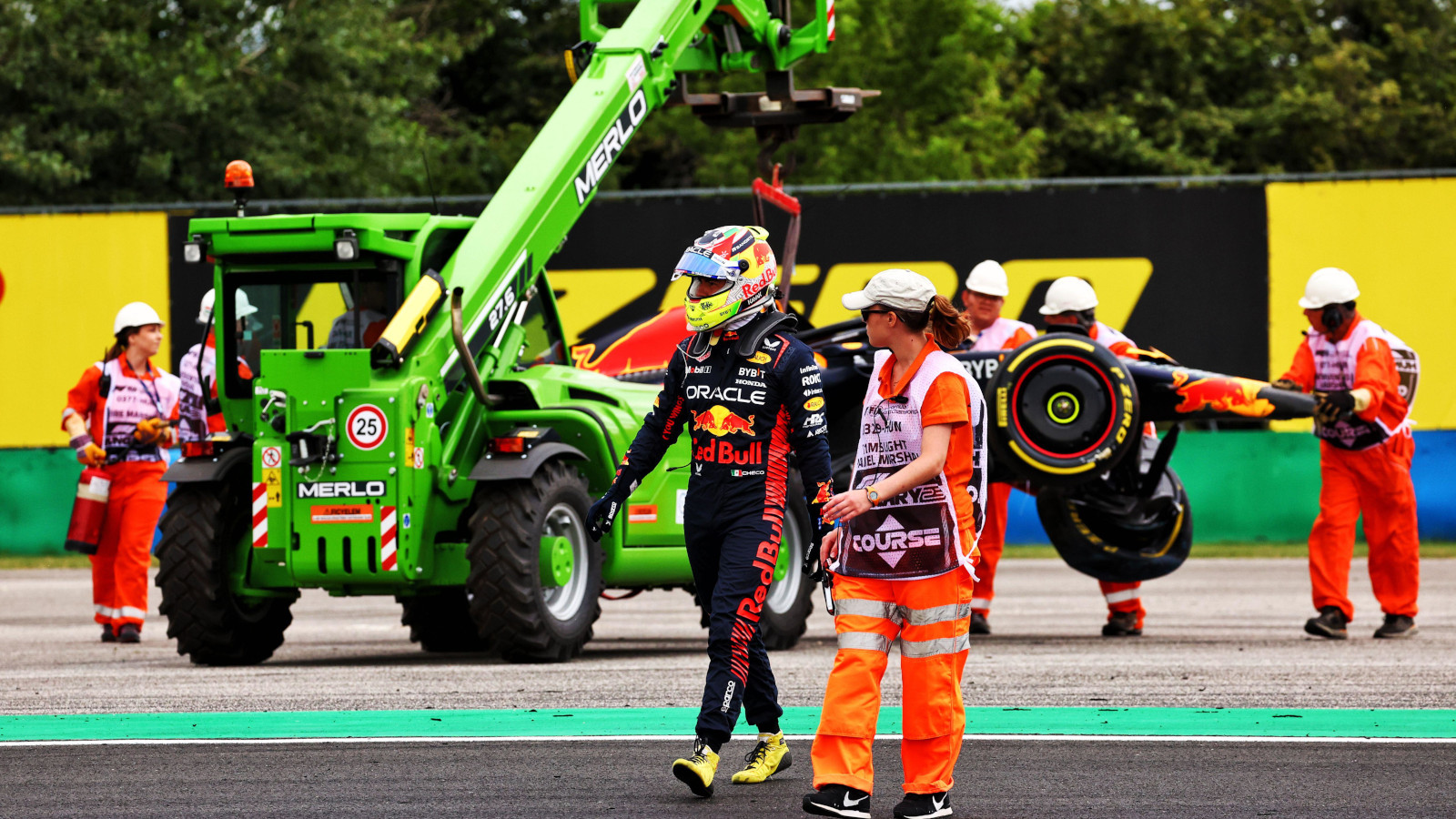 Sergio Perez walks away from his crashed RB19. Hungary July 2023