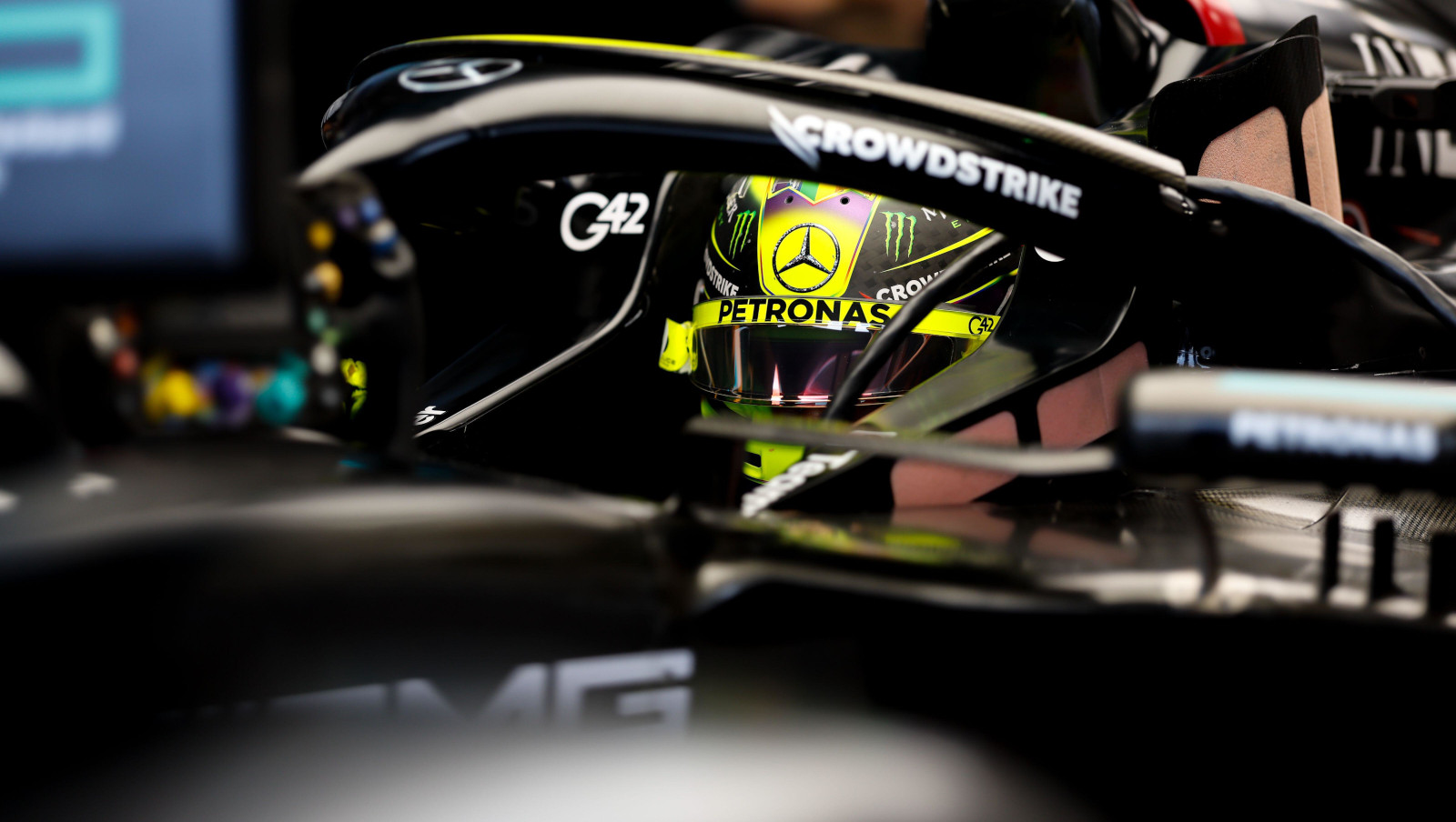 Lewis Hamilton up close sitting in the W14 in the garage. Hungary July 2023