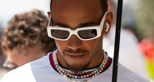Mercedes driver Lewis Hamilton makes his way through the paddock at the Hungarian Grand Prix. Budapest, July 2023.