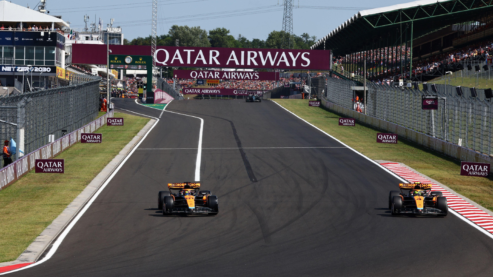 McLaren's Oscar Piastri and Lando Norris at the Hungarian Grand Prix. Budapest, July 2023.