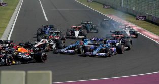 Alpine's Esteban Ocon and Pierre Gasly make contact in the Hungarian Grand Prix. Budapest, July 2023.