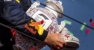 Red Bull's Max Verstappen holds his broken F1 trophy at the Hungarian Grand Prix. Budapest, July 2023.