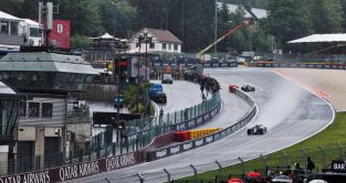 F1 cars on damp Spa-Francorchamps track. Belgium, July 2023.