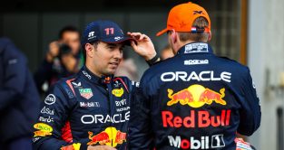 与红牛team-ma塞尔吉奥·佩雷斯在交谈te Max Verstappen after Belgian Grand Prix qualifying. Spa, July 2023.