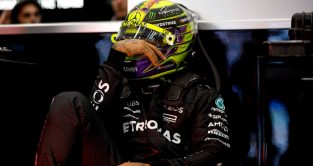 Lewis Hamilton takes a moment in the Mercedes garage at the Belgian Grand Prix. Spa, July 2023.