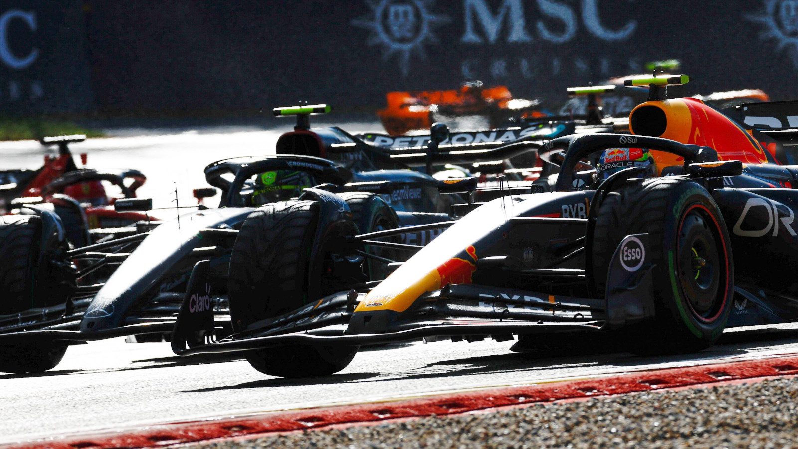 Lewis Hamilton got his Mercedes alongside the Red Bull of Sergio Perez. Belgium July 2023