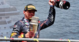 Max Verstappen, Red Bull, holds winner's trophy. Belgium, July 2023.