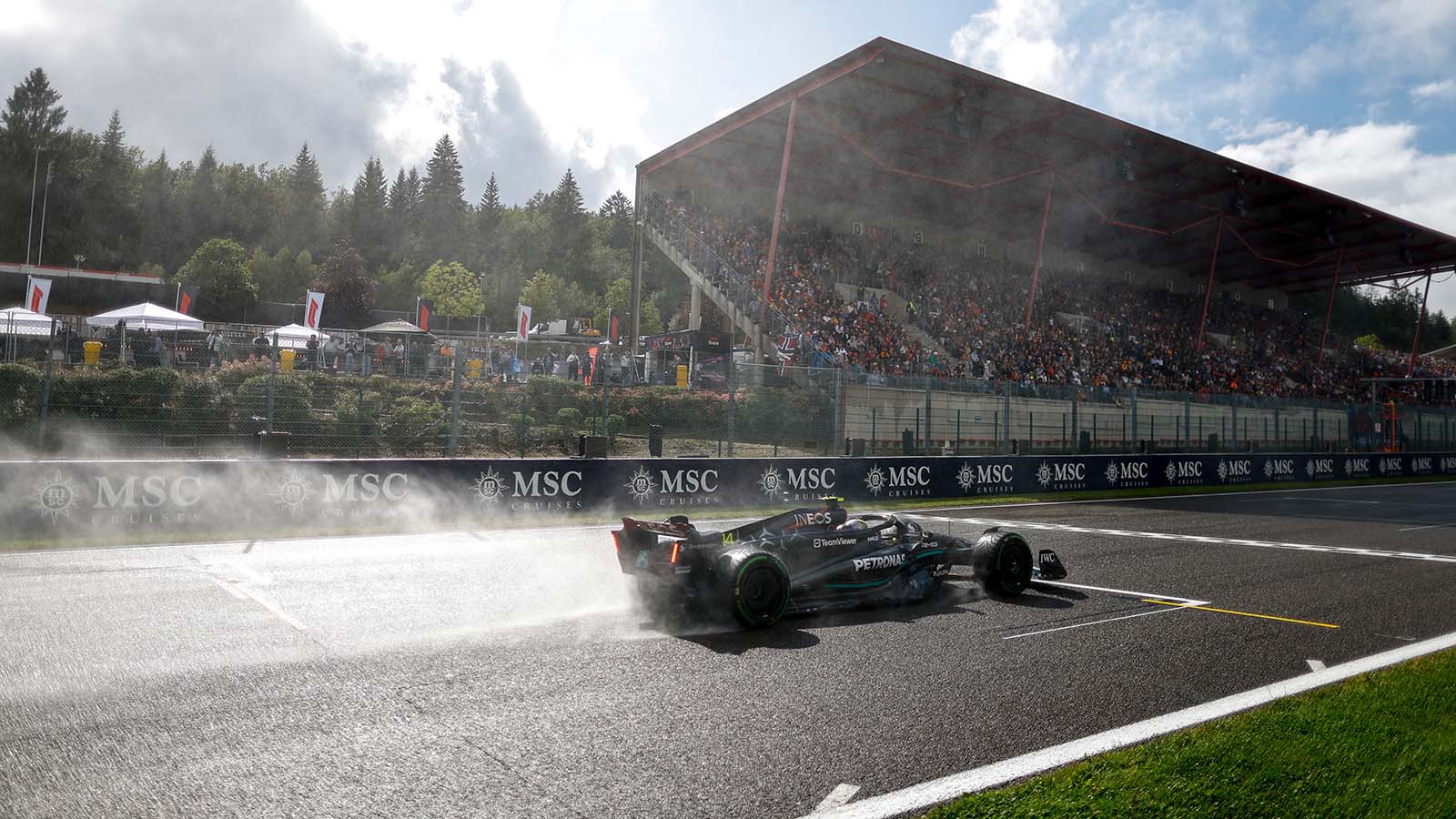 The Mercedes W14 passes the grandstand at the Belgian Grand Prix