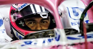 Sergio Perez watches on from the cockpit during practice at the Abu Dhabi Grand Prix