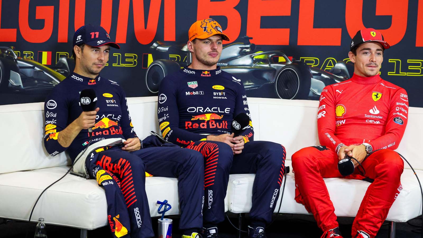 Sergio Perez, Max Verstappen and Charles Leclerc in the press conference.