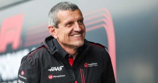 Haas team boss Guenther Steiner smiles.