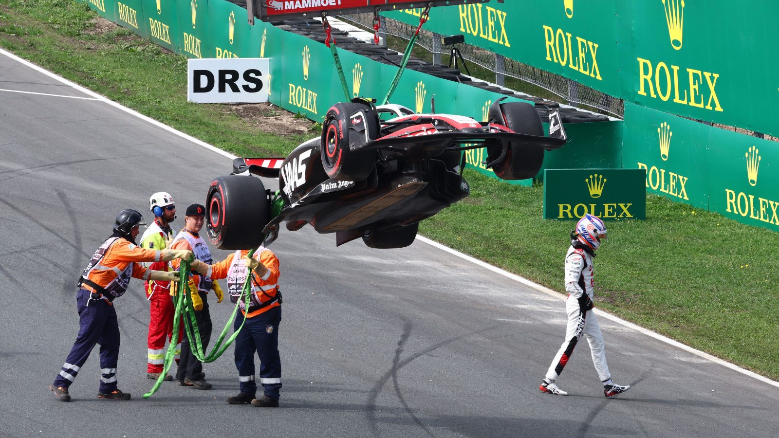 Haas driver Nico Hulkenberg walks away from his crashed Haas in FP1 for the Dutch Grand Prix
