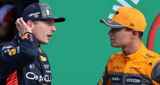 Max Verstappen (Red Bull) in conversation with Lando Norris (McLaren) after Dutch Grand Prix qualifying at Zandvoort.