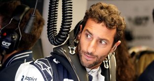 Daniel Ricciardo checks out the view from the AlphaTauri garage in Zandvoort