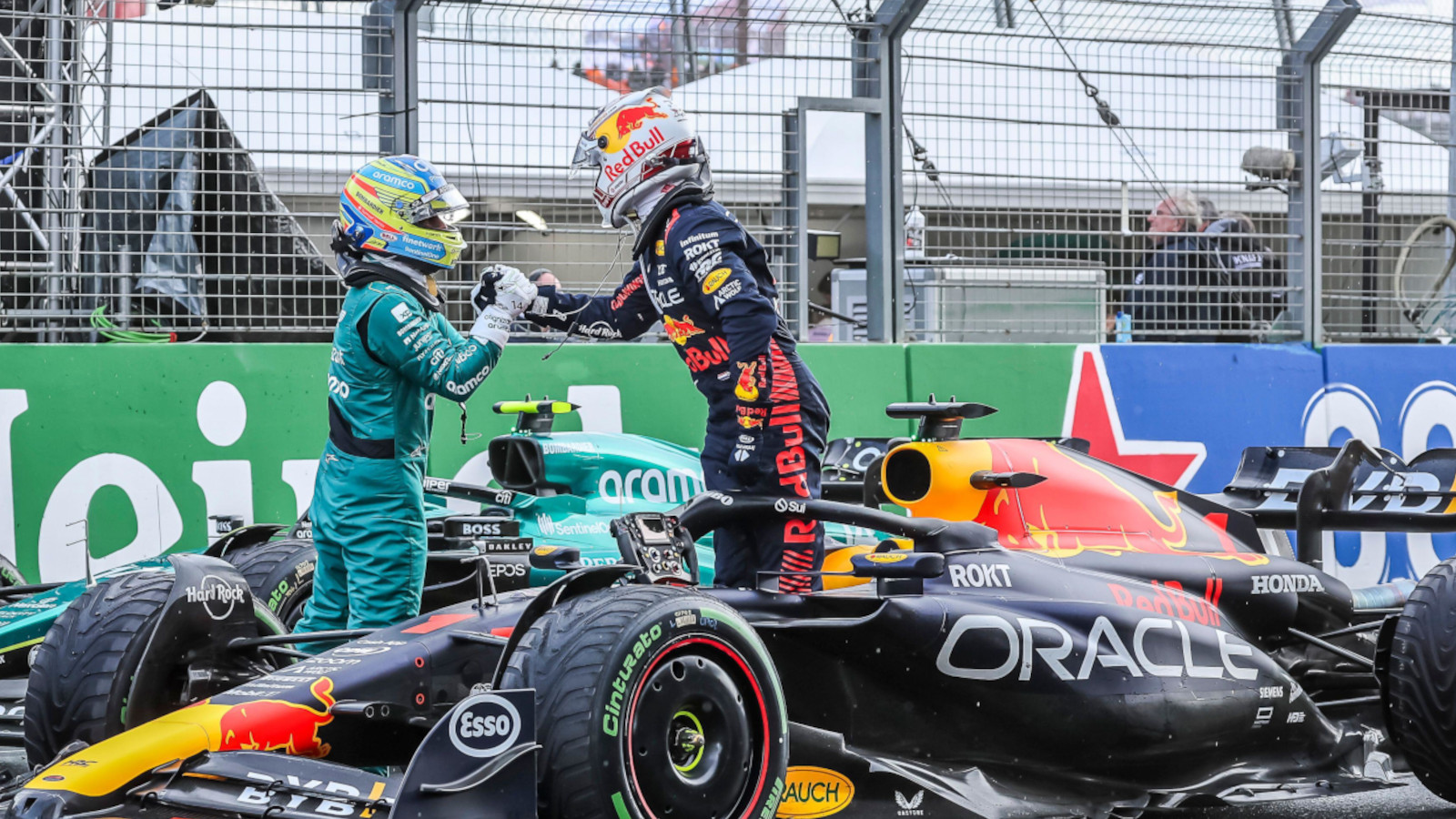 Fernando Alonso goes over to congratulates Max Verstappen for winning the Dutch GP.