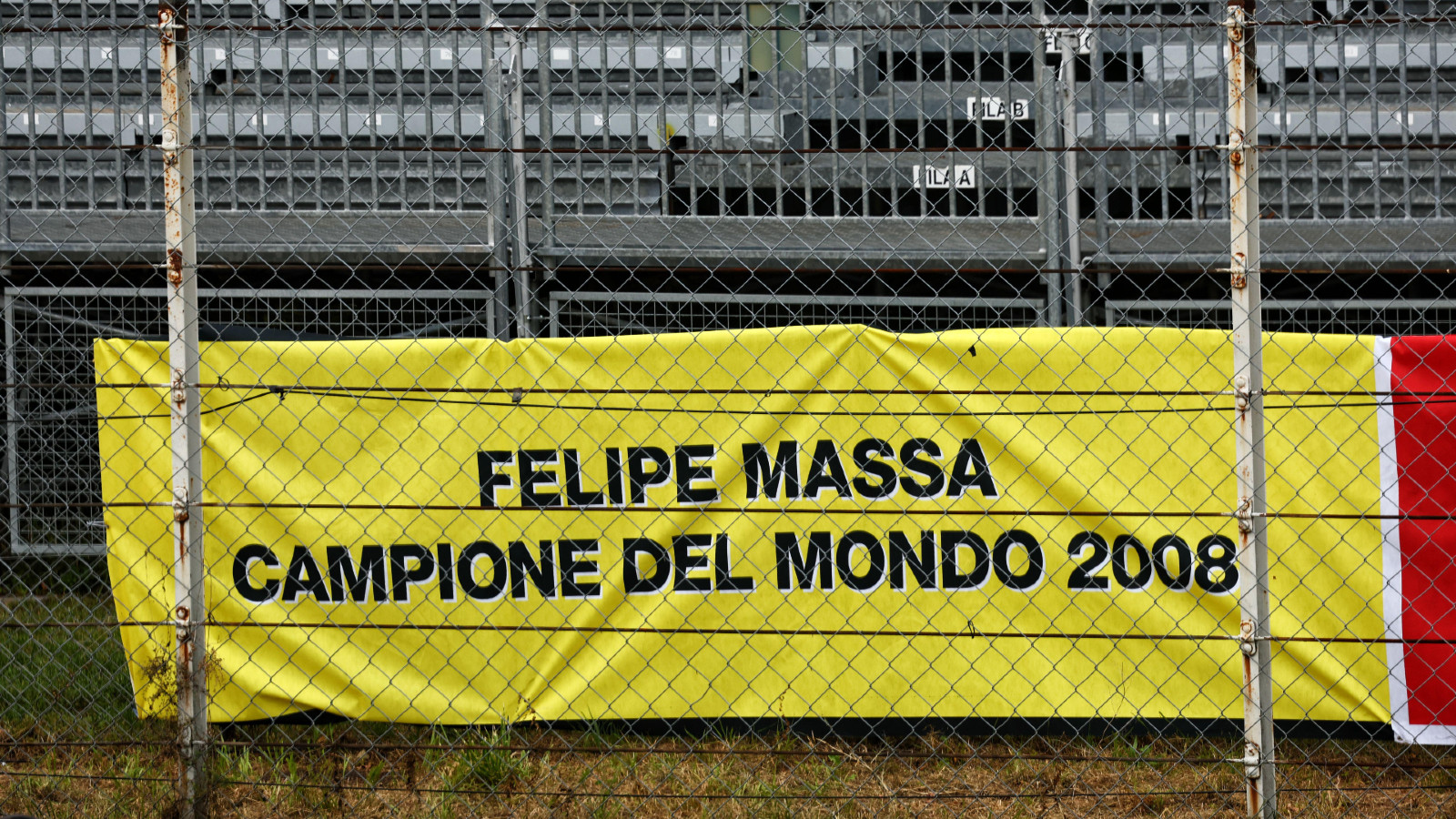 Felipe Massa banner hangs on the fence at the Italian Grand Prix.