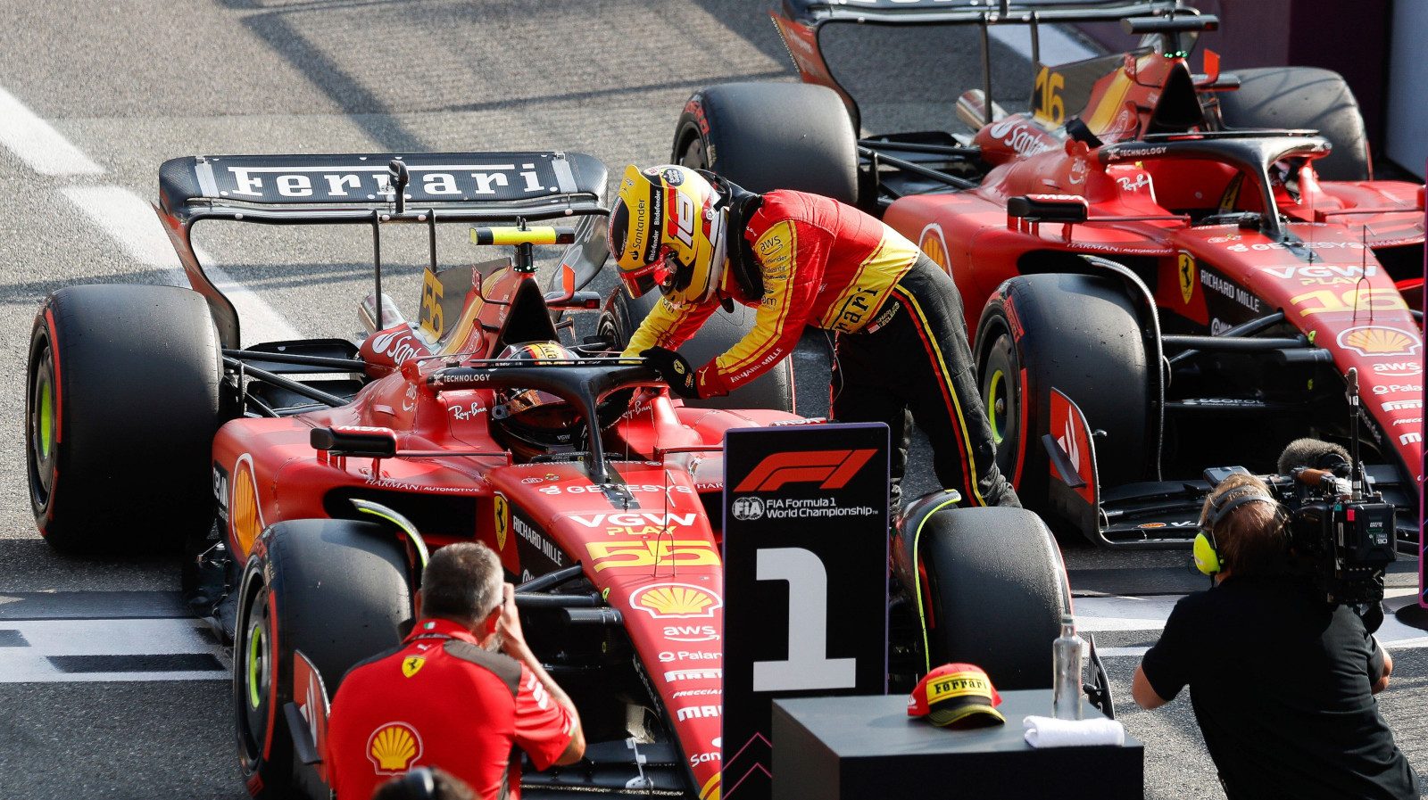 Charles Leclerc congratulates Carlos Sainz on his Monza pole position.