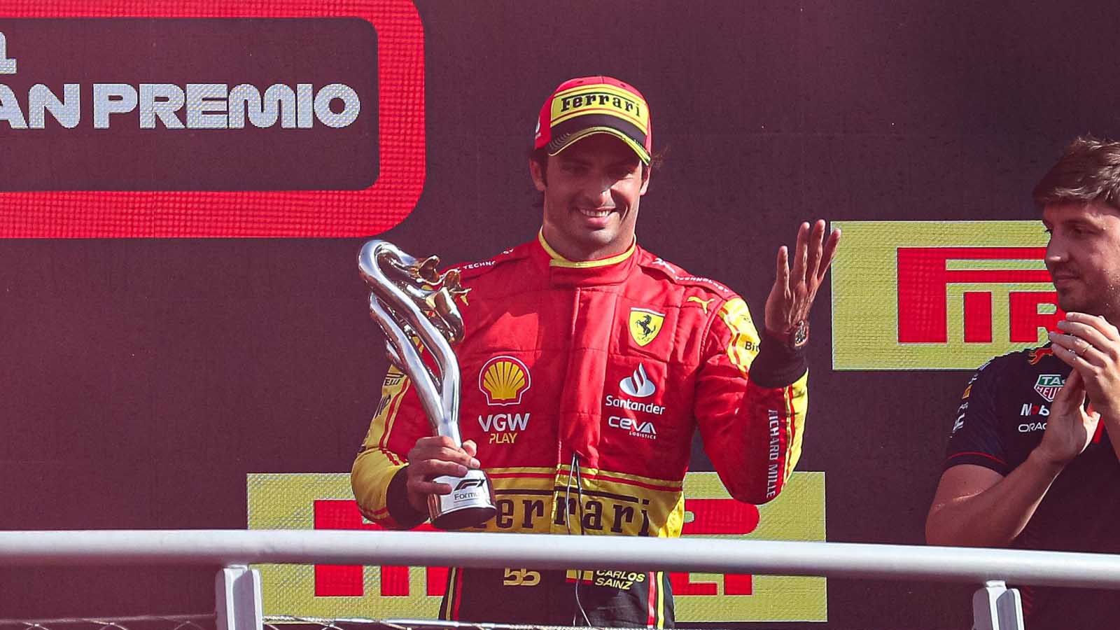 Carlos Sainz celebrates on the podium at Monza.