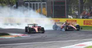 法拉利队友卡洛斯和Charl赢面es Leclerc fighting for position at the Italian Grand Prix.