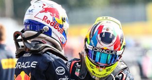 Max Verstappen and Sergio Perez embrace after securing a Red Bull one-two finish at the Italian Grand Prix at Monza.