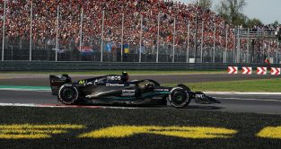 Monza: Lewis Hamilton drives his Mercedes through the first chicane at the Italian Grand Prix.