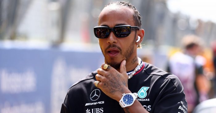 Lewis Hamilton makes his way through the paddock area at the Italian Grand Prix.