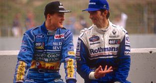 Bitter title rivals Michael Schumacher (Benetton) and Damon Hill (Williams) in conversation during the F1 1994 season.