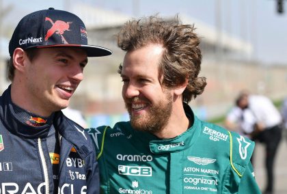 Sebastian Vettel with his arm around Max Verstappen in the pre 2022 group grid event.