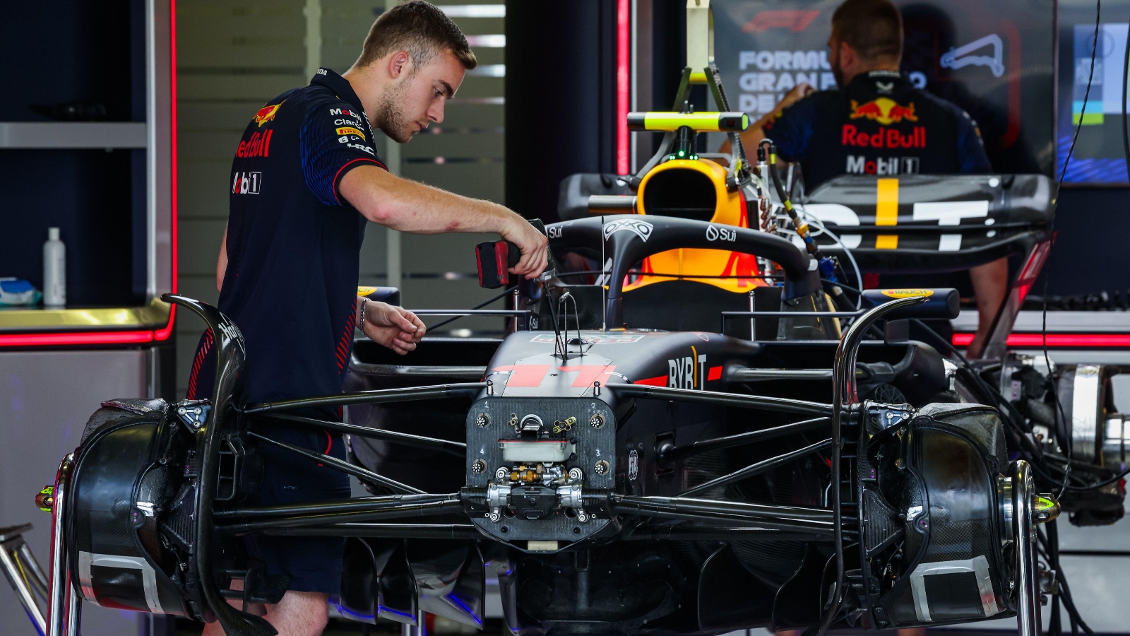 An engineer works on the RB19
