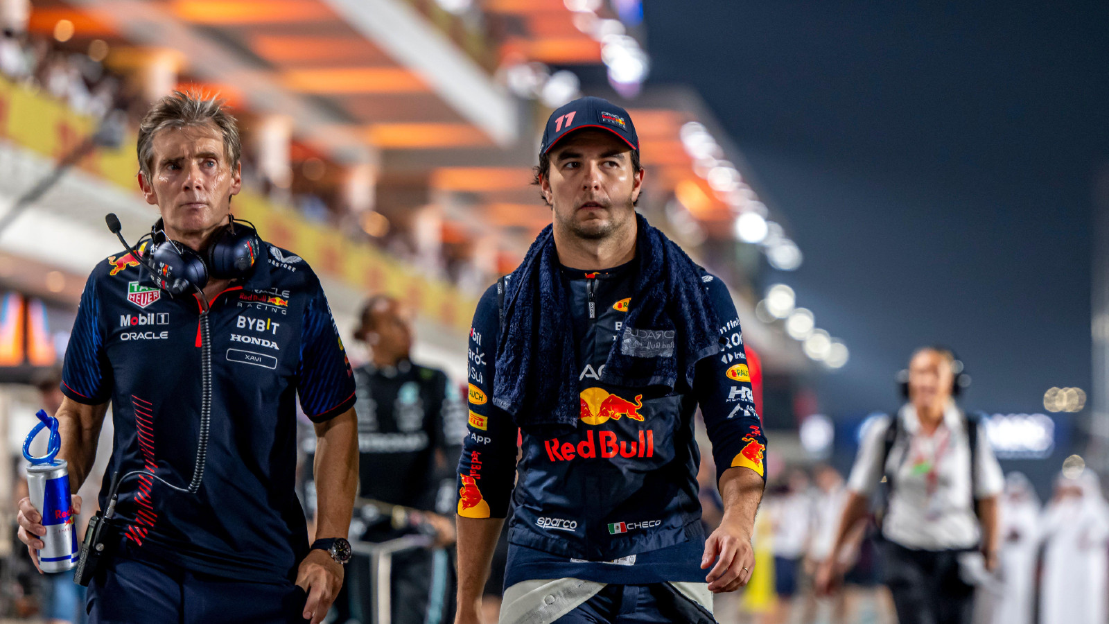 Sergio Perez walks along the pitlane at the Lusail Circuit during the Qatar Grand Prix weekend.