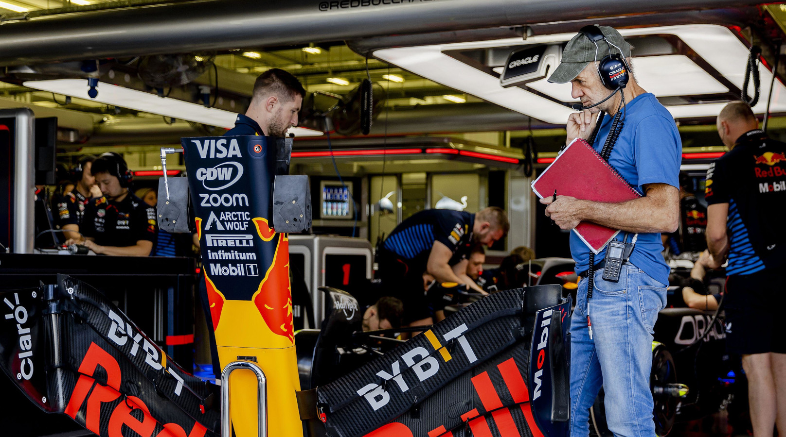 Adrian Newey looking at the Red Bull RB20 front wing.