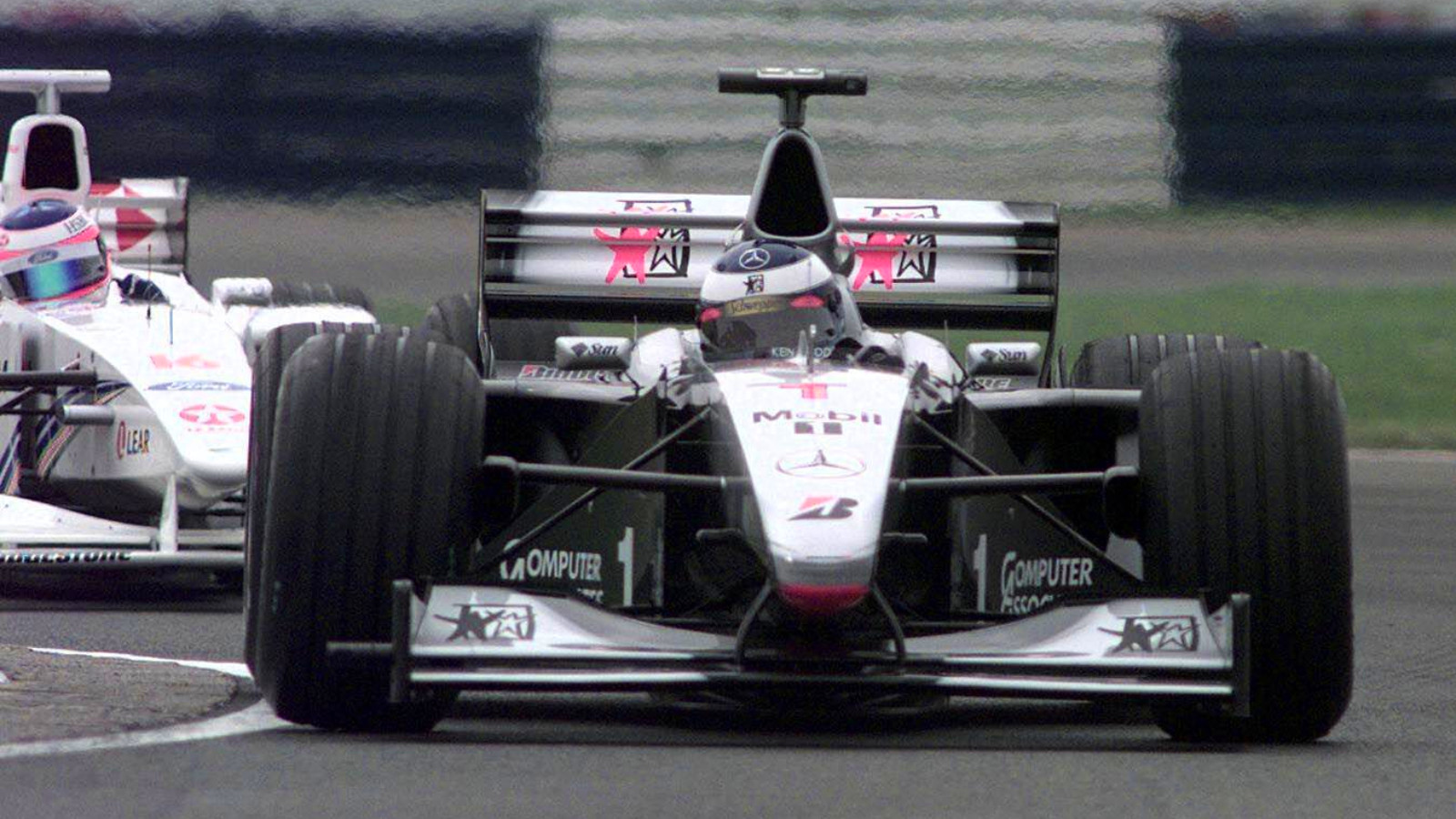 Mika Hakkinen driving his McLaren MP4/14 at the 1999 British Grand Prix.