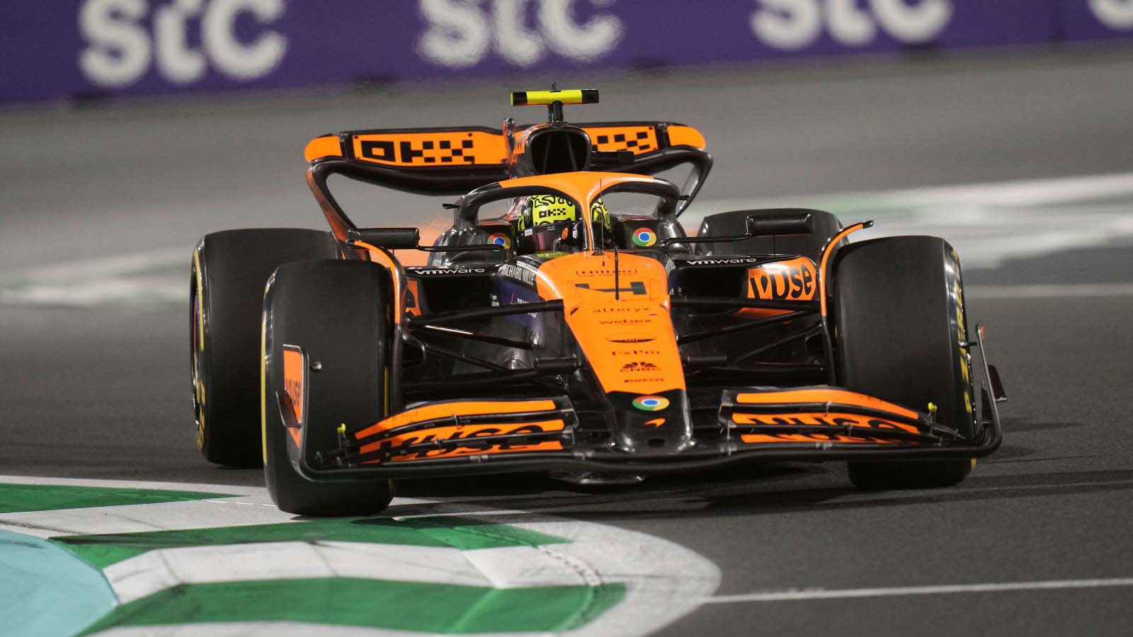 McLaren driver Lando Norris rounds the opening chicane.