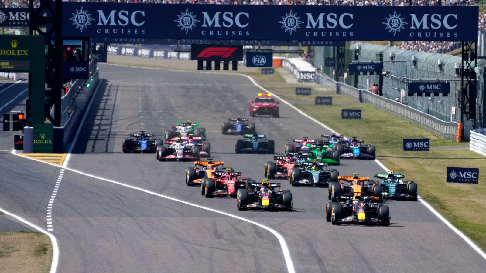Max Verstappen, Sergio Perez, Red Bull, 2024 Japanese Grand Prix.
