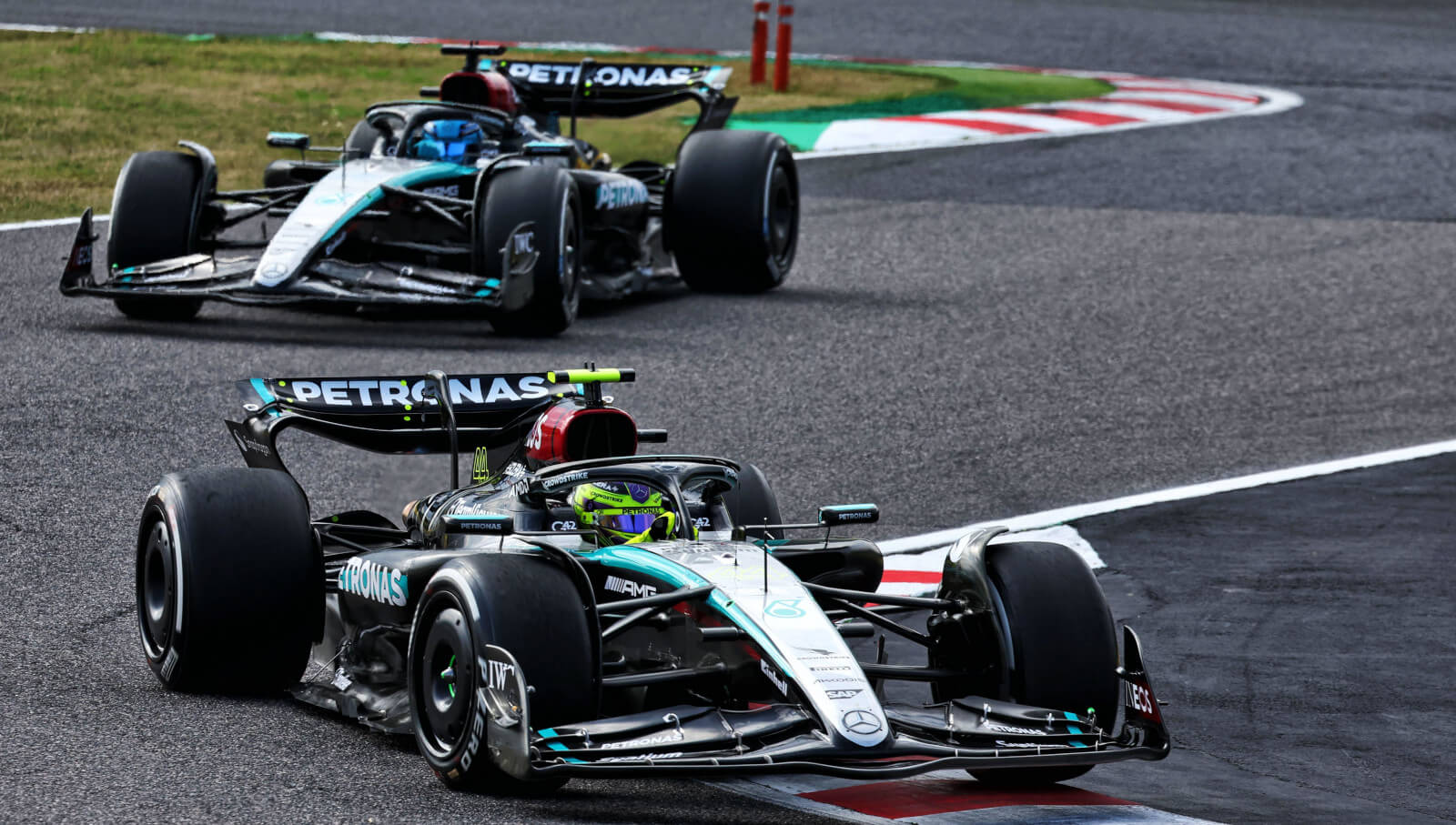 Lewis Hamilton leads George Russell in Mercedes formation