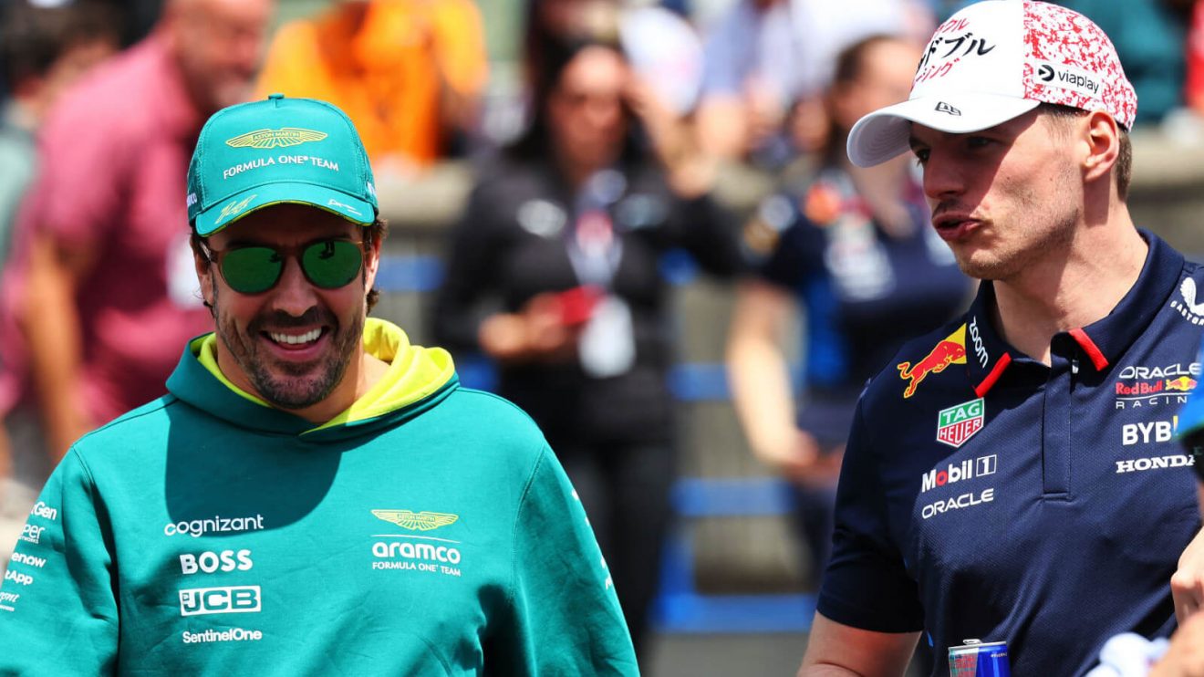Fernando Alonso chatting with Max Verstappen