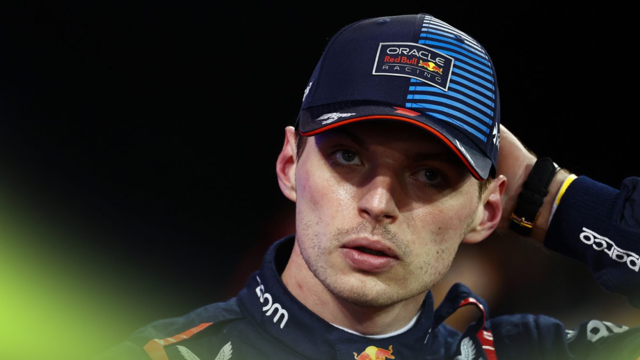 Max Verstappen adjusts his cap in parc ferme in Bahrain