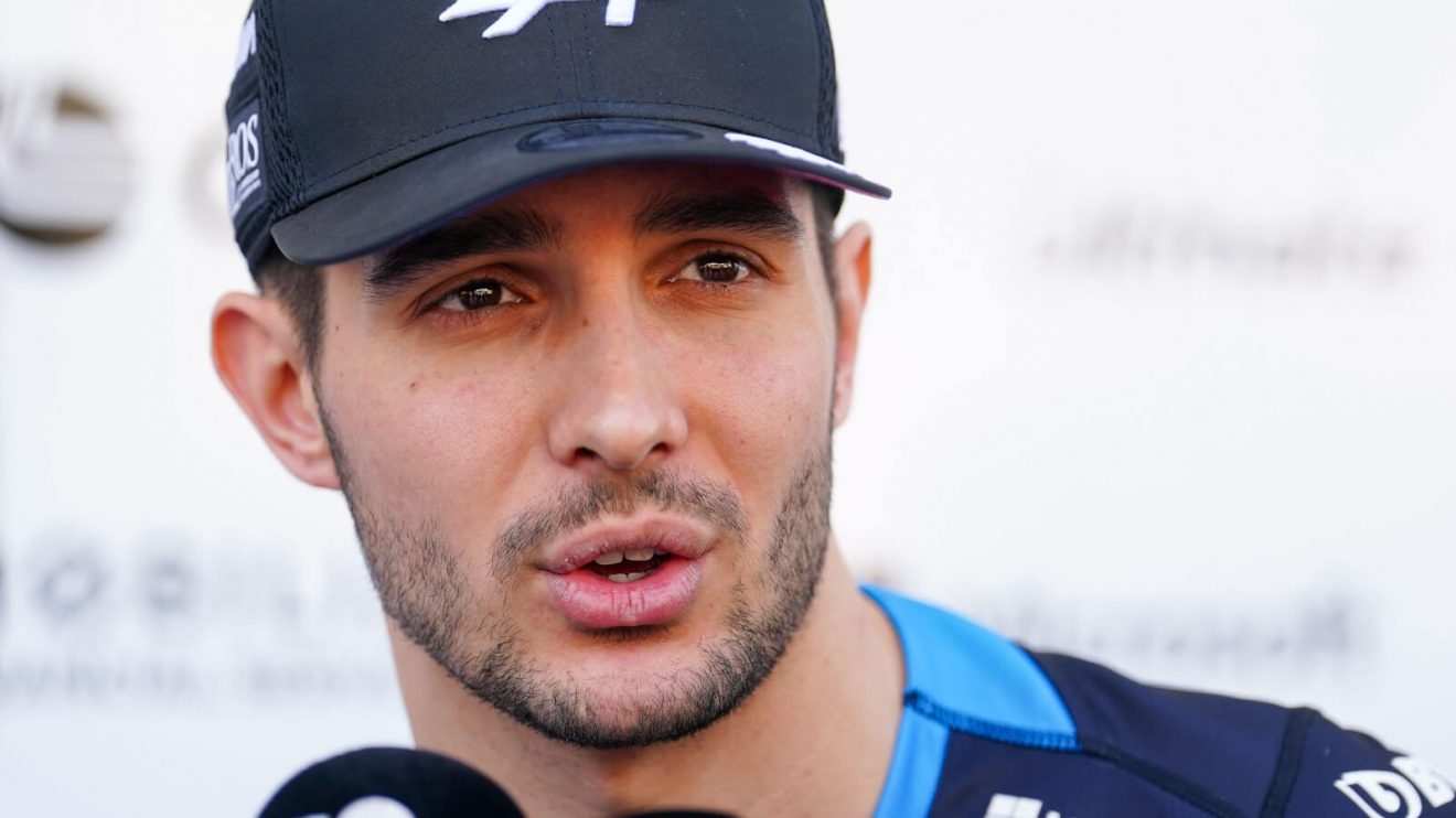 Esteban Ocon speaks with the media
