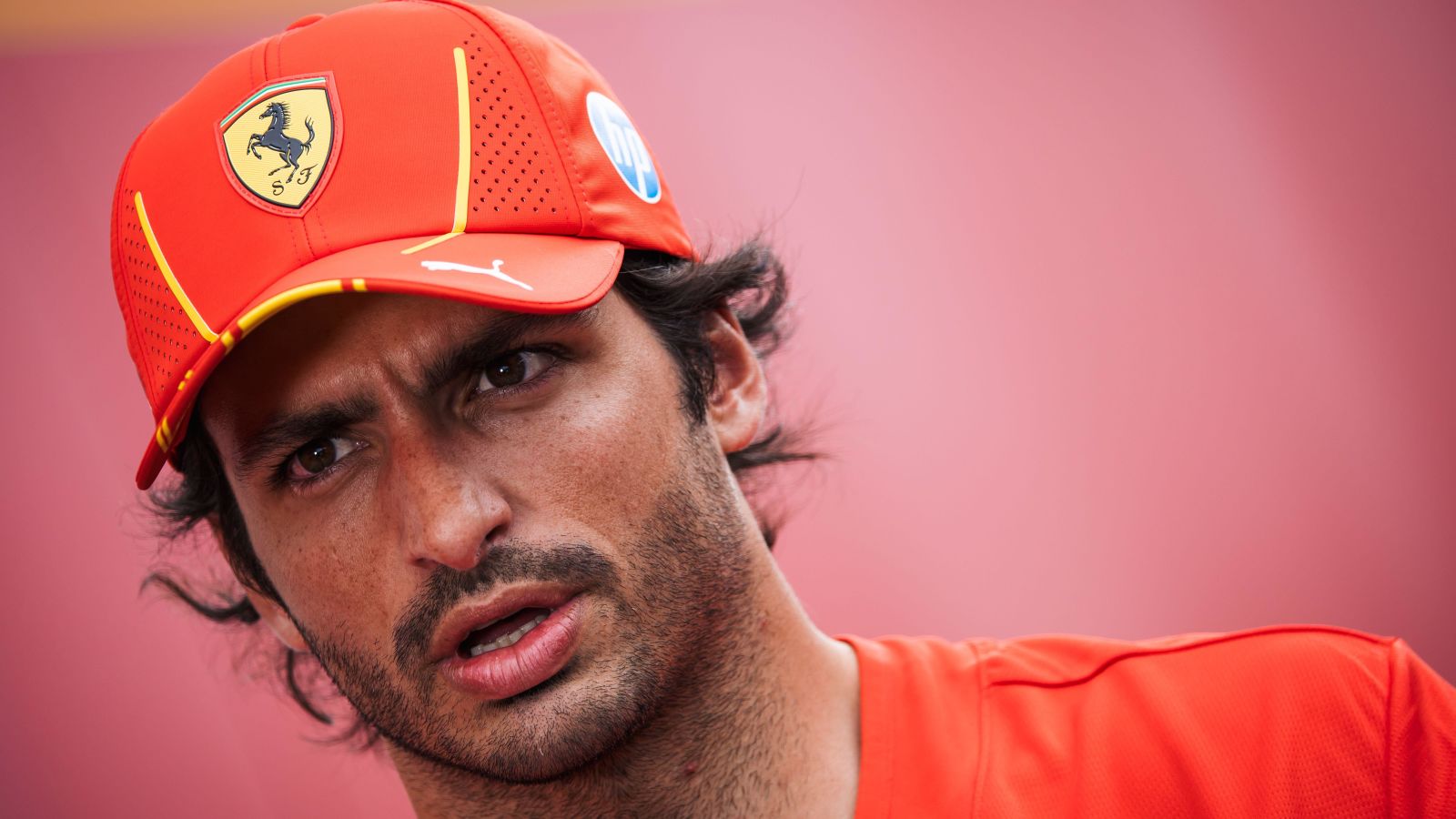 Ferrari driver Carlos Sainz looks serious ahead of the 2024 Canadian Grand Prix.