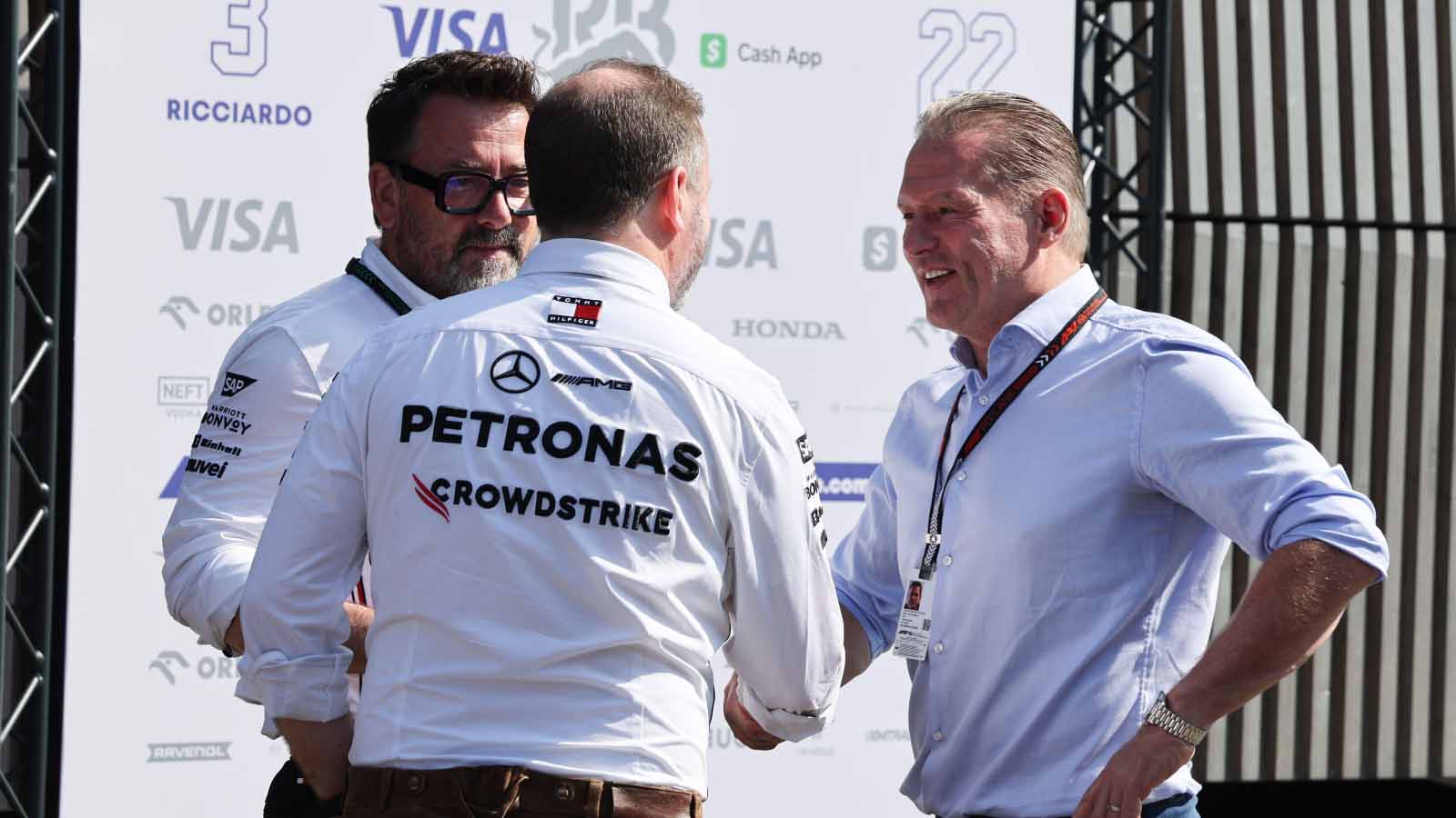 Jos Verstappen meets Mercedes staff members.