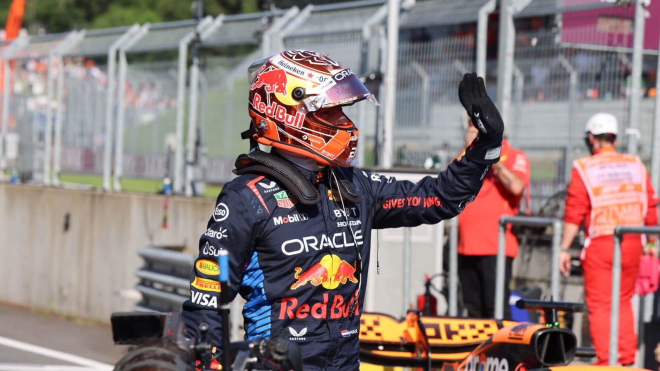 Max Verstappen waves at the fans