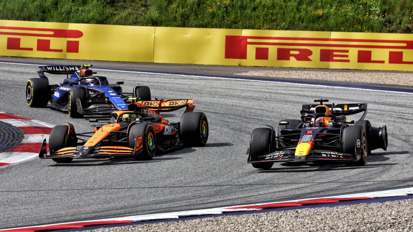 Max Verstappen with a rear left puncture after colliding with Lando Norris