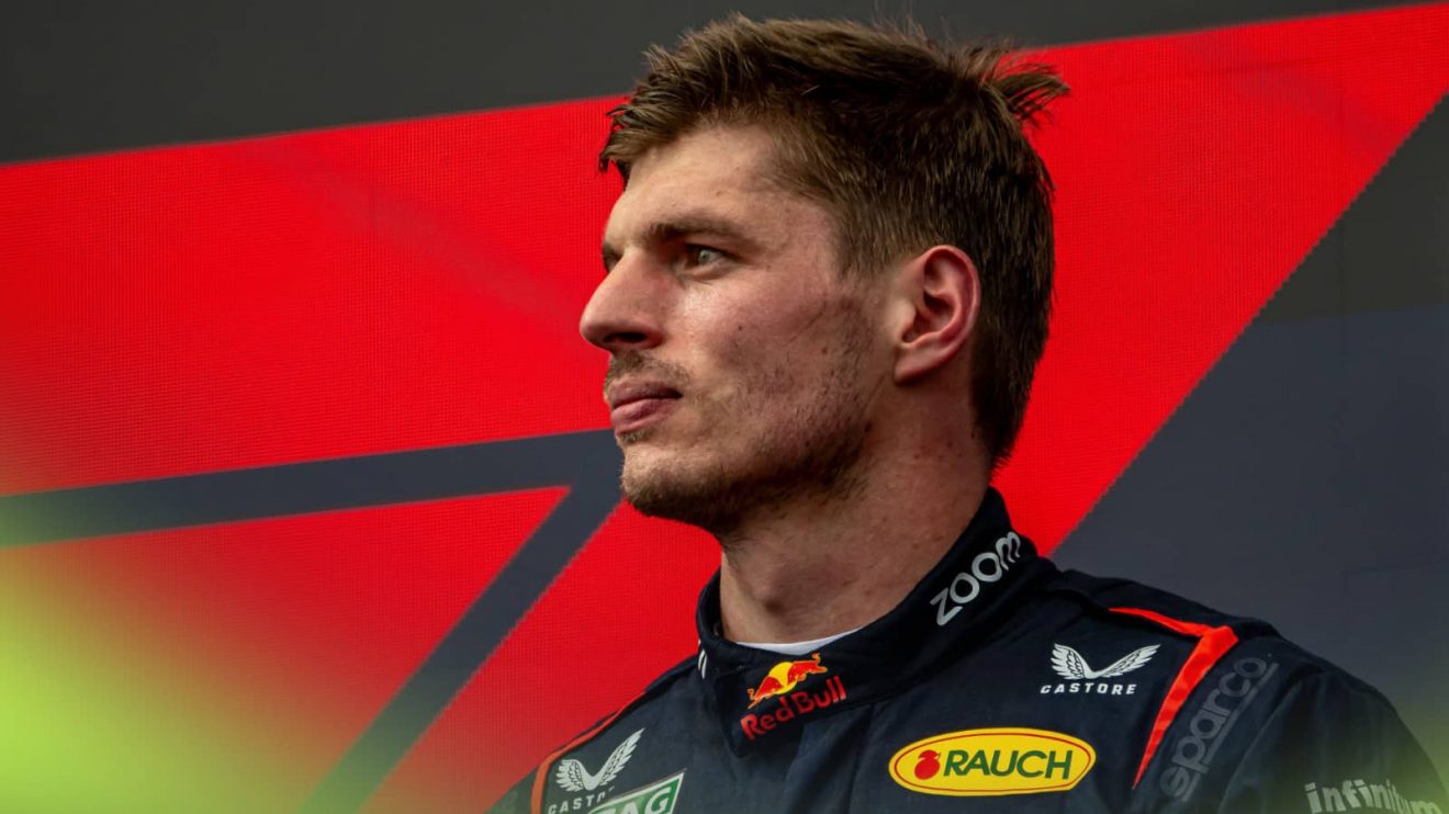 Max Verstappen looks on during the podium ceremony at Imola