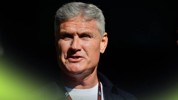 David Coulthard in conversation against a black background